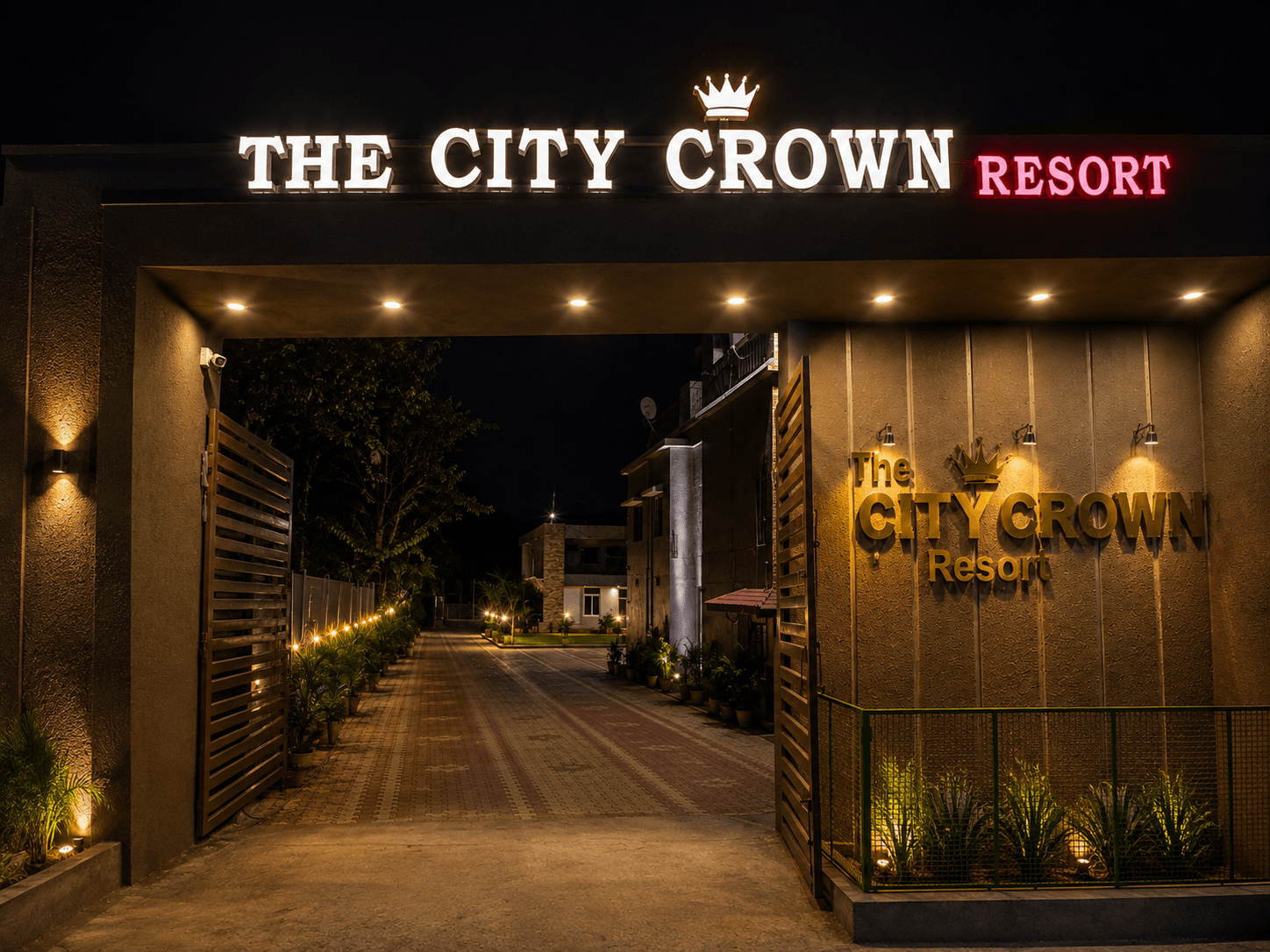The City Crown Resort entrance signage at night, Giridih